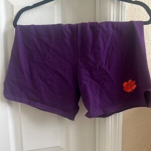 Purple with orange paw print